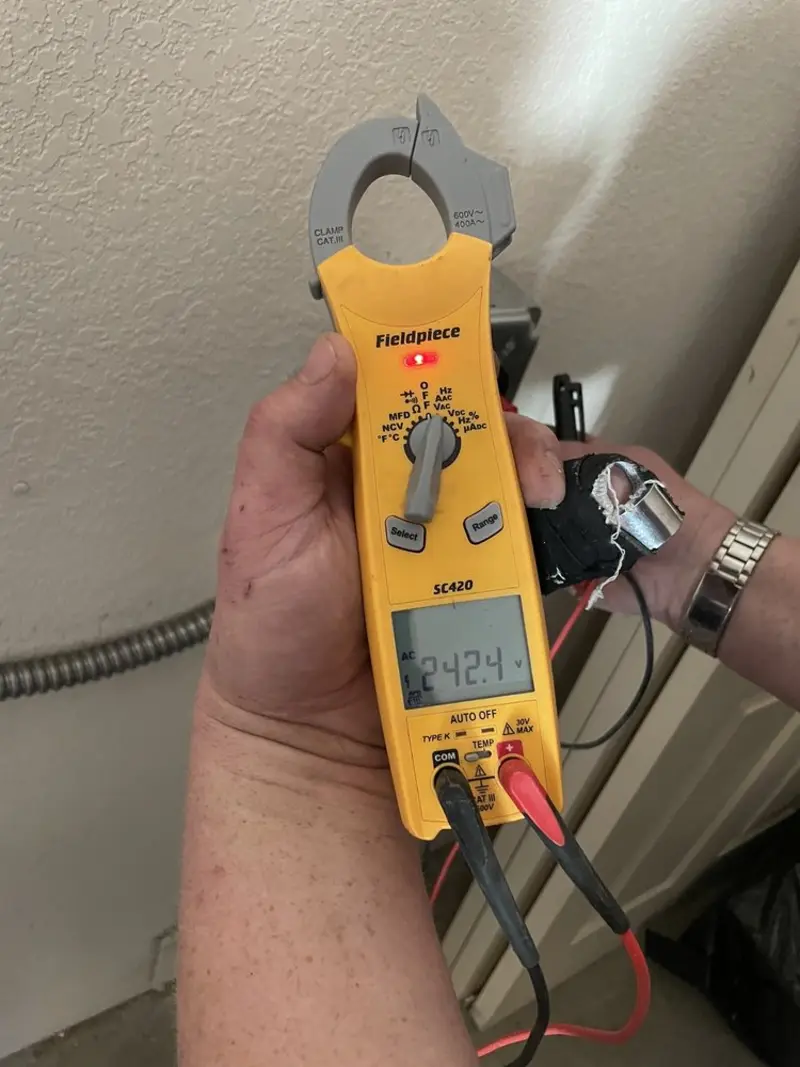 Voltage testing with clamp meter during Generator Installation in Smithfield